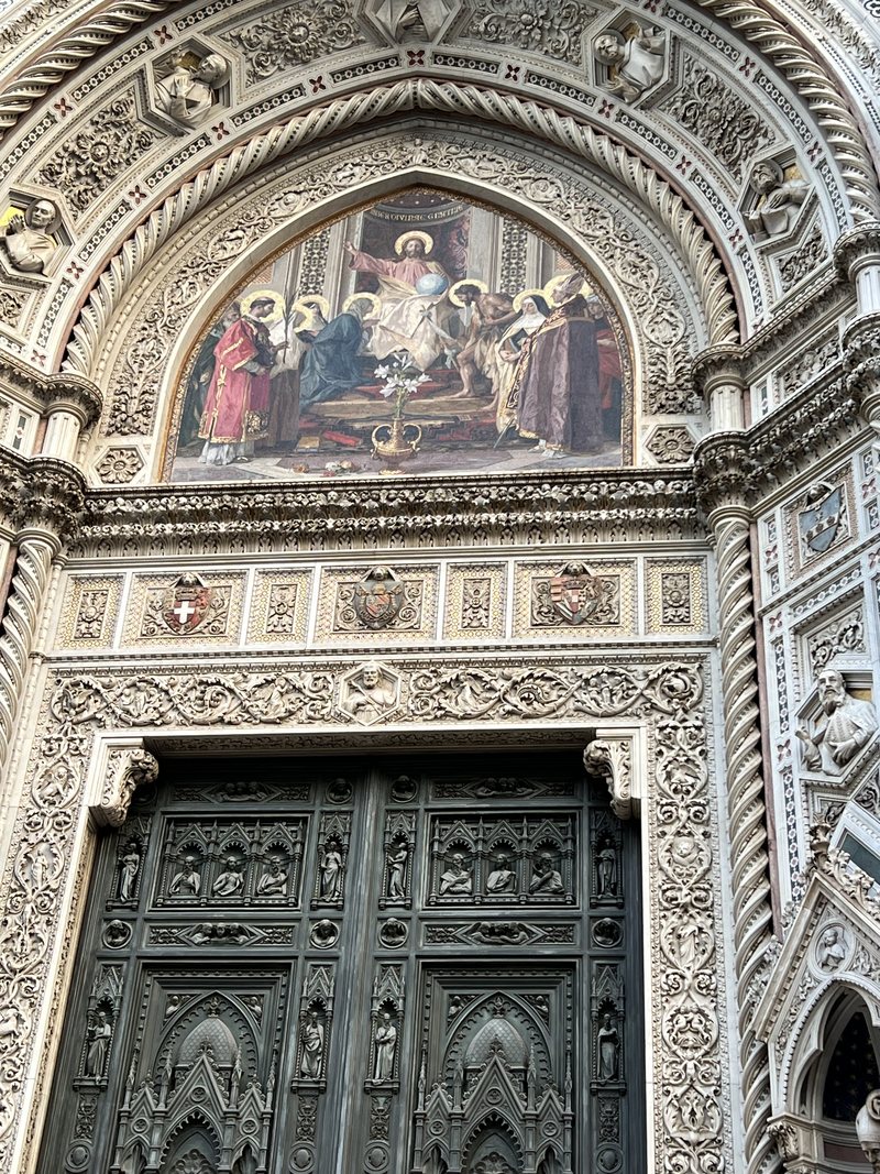 The mosaic lunette above the central door